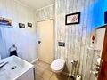 makellos 06 EFH Velgast - Gäste WC mit Zugang zum Heizungsraum.jpg
