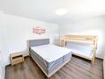 makellos 10 EFH Nienhagen - Schlafzimmer EG.jpg