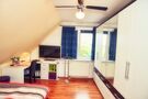makellos EFH Broderstorf - Zimmer 3.2 DG.jpg